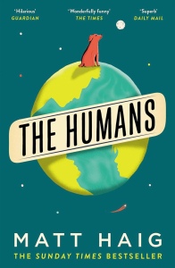 The Humans book cover. A dark green background with a simple cartoon planet earth in the centre with an orange/brown dog sitting on top. Title text is black encased in a gold sticker/frame that goes across earth. 